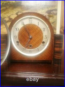 Antique Westminster Chime clock in good condition. Working