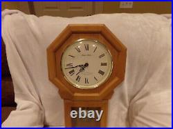 Daniel Dakota quartz Westminster chime hanging wall clock, oak. Works great