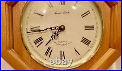 Daniel Dakota quartz Westminster chime hanging wall clock, oak. Works great