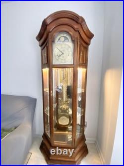 Howard Miller 610-441 Grandfather Clock withChime Runs Slow Sometimes Cherry Finis