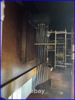 Howard Miller 610-441 Grandfather Clock withChime Runs Slow Sometimes Cherry Finis