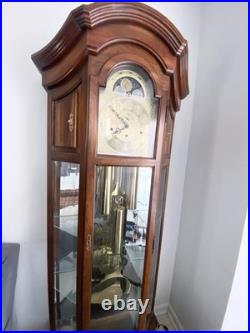 Howard Miller 610-441 Grandfather Clock withChime Runs Slow Sometimes Cherry Finis