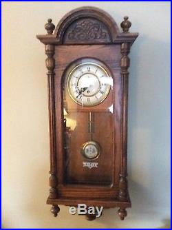 Howard Miller 612-462 Oak Wall Clock Key Wound 8 Day With Westminster Chime