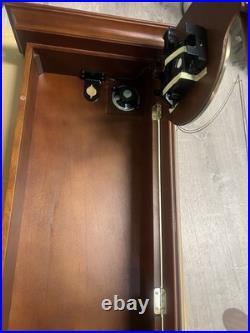 Howard Miller Ambassador Collection Wall Mounted Dial Grandfather Clock