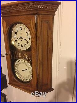 Howard Miller Calendar Clock Westminster Chimes 20x28 Inches Tall 6 Deep