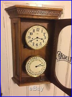 Howard Miller Calendar Clock Westminster Chimes 20x28 Inches Tall 6 Deep