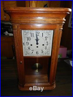 Howard Miller Sandringham 1/4 Hour Westminster Chime Oak Wall Clock 613-108