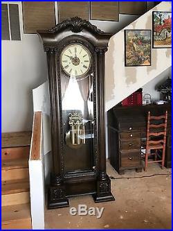 Howard miller grand father clock model 611-008 with Westminster chime