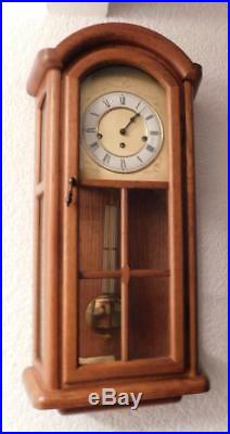 Oak cased westminster chimes wall clock