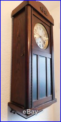 Oak cased westminster chiming wall clock