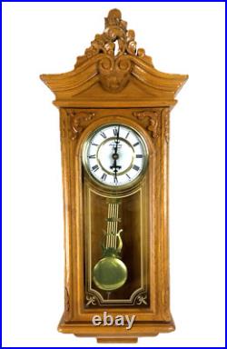 Strausburg Manor Oak Quartz Westminster Triple Chime Pendulum Wall Clock