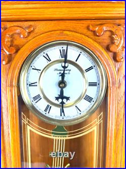 Strausburg Manor Oak Quartz Westminster Triple Chime Pendulum Wall Clock