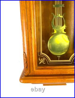 Strausburg Manor Oak Quartz Westminster Triple Chime Pendulum Wall Clock