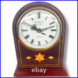 Westminster Chime quartz mantel or desk clock with a wood case and an arched top