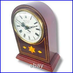 Westminster Chime quartz mantel or desk clock with a wood case and an arched top