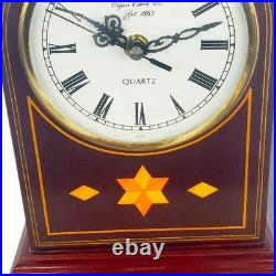 Westminster Chime quartz mantel or desk clock with a wood case and an arched top